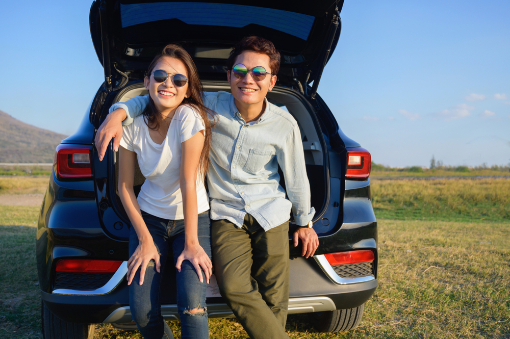 couple in new suv